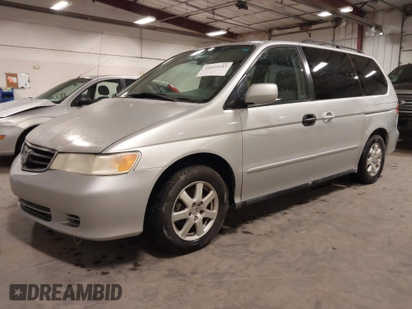2004 Honda Odyssey EX-L with VIN 5FNRL18974B127696, listed as a IAAI auction lot 41643243 with 200,286 mi miles and . Bid and sale history available at DreamBid. Image 2.