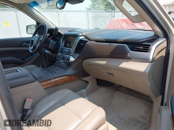 2015 Chevrolet Tahoe LTZ z VIN 1GNSKCKC0FR113647, wystawiony jako IAAI lot #42288089 z przebiegiem 113 322 mil mil oraz . Historia ofert i sprzedaży dostępna na DreamBid. Obrazek 5.