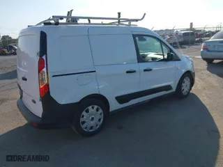 2021 Ford Transit Connect Van XL with VIN NM0LS6E25M1488265, listed as a IAAI auction lot 40655182 with 21,583 mi miles. Bid and sale history available at carsss.com. Image 4.