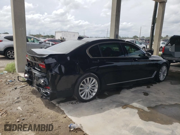 2017 BMW 7 Series 740i with VIN WBA7E2C31HG741176, listed as a Copart auction lot 65698233 with 27,332 mi miles. Bid and sale history available at carsss.com. Image 3.