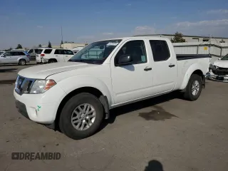 2019 Nissan Frontier SV with VIN 1N6AD0FR5KN751497, listed as a Copart auction lot 74757674 with 92,657 mi miles and Salvage title. Bid and sale history available at DreamBid. Image 1.