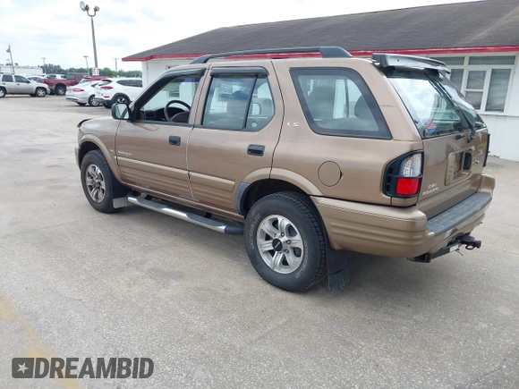 2000 Isuzu Rodeo S with VIN 4S2CK58W3Y4316966, listed as a IAAI auction lot 42003598 with 106,187 mi miles and . Bid and sale history available at carsss.com. Image 3.