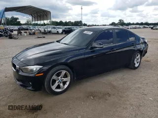2014 BMW 3 Series 328i xDrive with VIN WBA3B3C54EJ982260, listed as a Copart auction lot 63066595 with 158,941 mi miles and Salvage title. Bid and sale history available at DreamBid. Image 1.