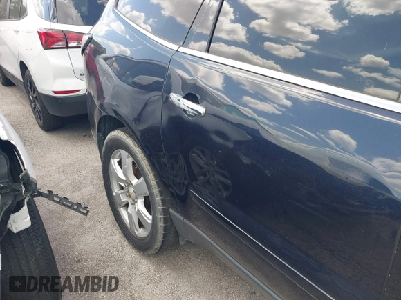 2016 Chevrolet Traverse LT with VIN 1GNKRGKD4GJ307061, listed as a IAAI auction lot 40880472 with 200,802 mi miles. Bid and sale history available at carsss.com. Image 19.