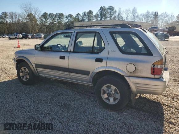 1999 Isuzu Rodeo S with VIN 4S2CK58W7X4357910, listed as a Copart auction lot 86955254 with 105,593 mi miles and Salvage Title. Bid and sale history available at DreamBid. Image 2.
