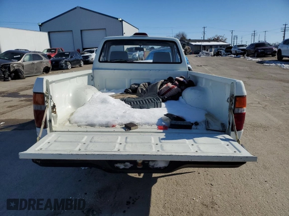1994 Toyota Pickup z VIN JT4RN81AXR5183793, wystawiony jako Copart lot #44929505 z przebiegiem 122 615 mil mil oraz Szkoda całkowita • Salvage title. Historia ofert i sprzedaży dostępna na DreamBid. Obrazek 10.