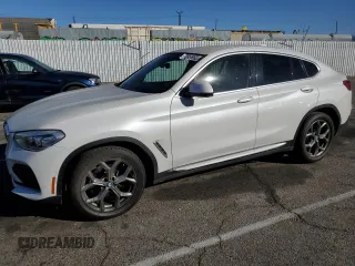 2020 BMW X4 xDrive30i with VIN 5UX2V1C09L9B97540, listed as a Copart auction lot 73984983 with 64,343 mi miles. Bid and sale history available at carsss.com. Image 1.