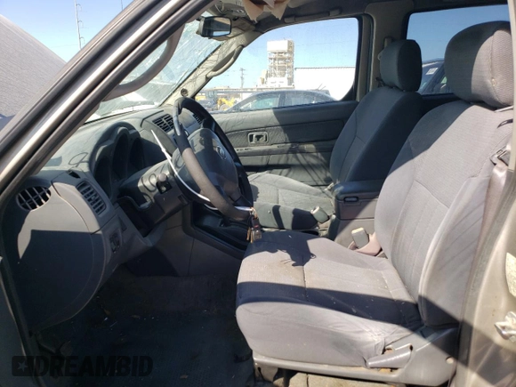 2002 Nissan Frontier SE with VIN 1N6ED27T52C383700, listed as a Copart auction lot 86204074 with 216,908 mi miles and Salvage title. Bid and sale history available at DreamBid. Image 7.