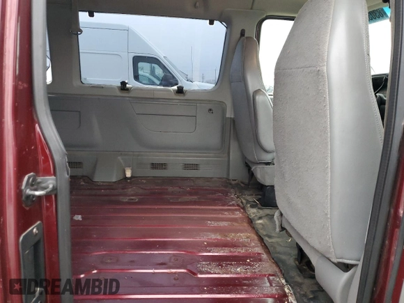 2004 Ford Econoline Passenger XL with VIN 1FMRE11W84HB06796, listed as a Copart auction lot 83033154 with 293,570 mi miles and Salvage Title. Bid and sale history available at DreamBid. Image 11.