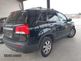 2011 Kia Sorento LX with VIN 5XYKTDA24BG170561, listed as a IAAI auction lot 42011756 with 211,833 mi miles. Bid and sale history available at carsss.com. Image 4.