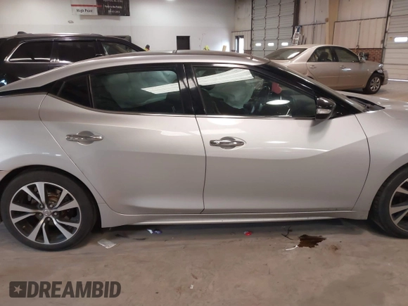 2018 Nissan Maxima SV with VIN 1N4AA6APXJC367526, listed as a IAAI auction lot 41427841 with 113,533 mi miles and . Bid and sale history available at DreamBid. Image 12.
