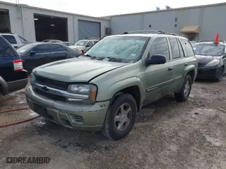 2003 Chevrolet TrailBlazer LS with VIN 1GNDS13S432108099, listed as a IAAI auction lot 41574257 with 166,211 mi miles. Bid and sale history available at carsss.com. Image 2.