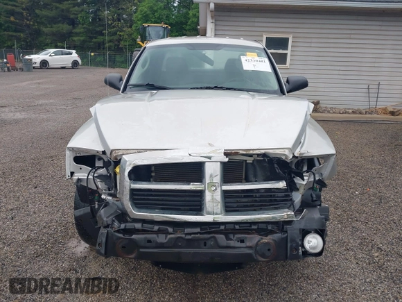 2007 Dodge Dakota ST z VIN 1D7HE22K37S177984, wystawiony jako IAAI lot #42330481 z przebiegiem 98 424 mil mil oraz . Historia ofert i sprzedaży dostępna na DreamBid. Obrazek 13.