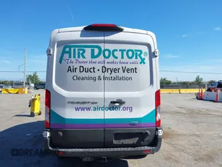 2023 Ford Transit Cargo with VIN 1FTBR1C89PKC07197, listed as a IAAI auction lot 42228682 with 39,306 mi miles and . Bid and sale history available at DreamBid. Image 16.