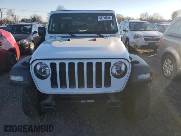 2020 Jeep Wrangler Unlimited Willys with VIN 1C4HJXDN9LW154108, listed as a Copart auction lot 84794694 with 64,609 mi miles and Salvage title. Bid and sale history available at DreamBid. Image 5.