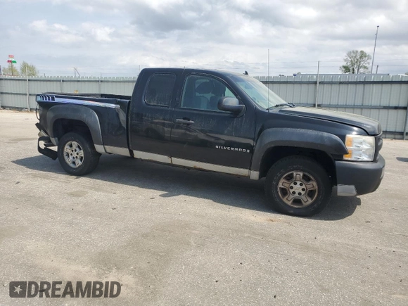 2009 Chevrolet Silverado 1500 Work Truck with VIN 1GCEK19069Z207199, listed as a Copart auction lot 51311125 with 114,759 mi miles and Salvage Title. Bid and sale history available at DreamBid. Image 4.