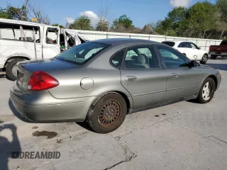 2003 Ford Taurus LX Standard with VIN 1FAFP52U13G243207, listed as a Copart auction lot 52763905 with 49,906 mi miles and Salvage title. Bid and sale history available at DreamBid. Image 3.