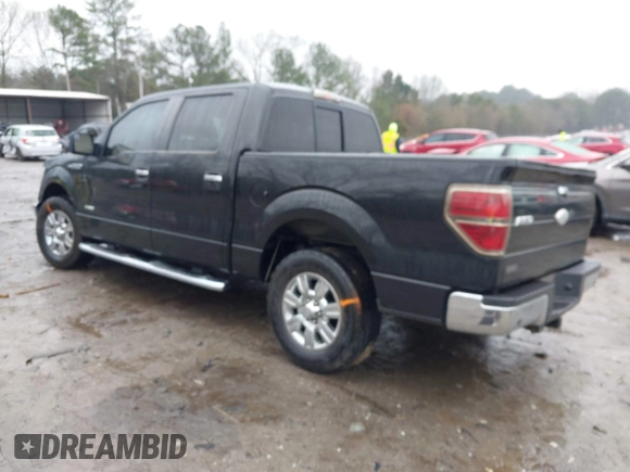2011 Ford F-150 XLT with VIN 1FTFW1CT5BFB13799, listed as a IAAI auction lot 41426609 with 200,000 mi miles. Bid and sale history available at carsss.com. Image 3.