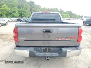 2014 Toyota Tundra 4WD Truck SR5 with VIN 5TFDW5F17EX410516, listed as a Copart auction lot 54867235 with 220,651 mi miles and Salvage Title. Bid and sale history available at carsss.com. Image 6.