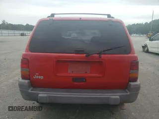 1998 Jeep Grand Cherokee Laredo with VIN 1J4FX58S3WC144684, listed as a Copart auction lot 67226694 with 106,602 mi miles and Clean Title. Bid and sale history available at carsss.com. Image 6.