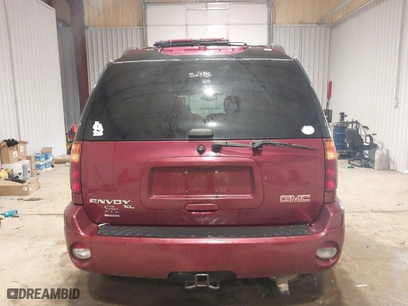 2006 GMC Envoy XL SLE with VIN 1GKET16S666128975, listed as a IAAI auction lot 41303944 with 292,318 mi miles. Bid and sale history available at carsss.com. Image 6.
