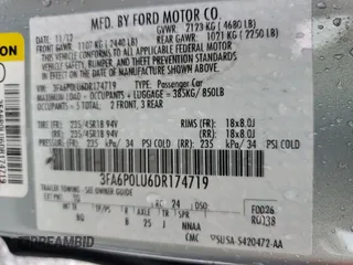 2013 Ford Fusion SE Hybrid z VIN 3FA6P0LU6DR174719, wystawiony jako Copart lot #62877715 z przebiegiem 52 884 mil mil oraz Szkoda całkowita • Salvage title. Historia ofert i sprzedaży dostępna na DreamBid. Obrazek 13.