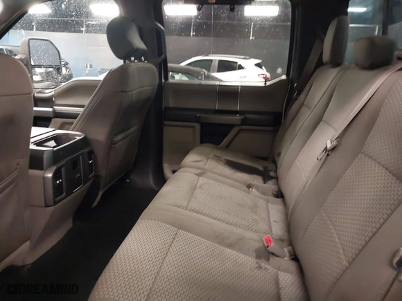 2015 Ford F-150 XLT w/HD Payload Pkg with VIN 1FTFW1EF8FKF09732, listed as a IAAI auction lot 41064468 with 105,340 mi miles. Bid and sale history available at carsss.com. Image 8.
