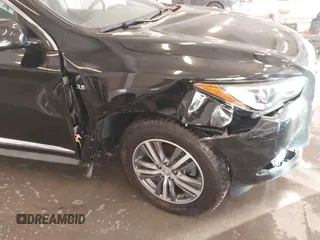 2020 Infiniti QX60 Pure with VIN 5N1DL0MN3LC533814, listed as a IAAI auction lot 41077349 with 79,377 mi miles and . Bid and sale history available at DreamBid. Image 6.