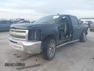 2013 Chevrolet Silverado 1500 LT with VIN 3GCPCSE00DG141940, listed as a IAAI auction lot 41882612 with Not Provided miles. Bid and sale history available at carsss.com. Image 2.