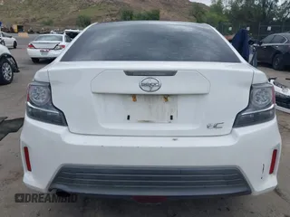 2014 Scion tC with VIN JTKJF5C79E3075707, listed as a IAAI auction lot 41557310 with 132,468 mi miles. Bid and sale history available at carsss.com. Image 17.