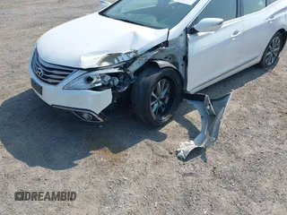 2015 Hyundai Azera z VIN KMHFG4JG3FA447672, wystawiony jako IAAI lot #42474930 z przebiegiem 125 425 mil mil oraz . Historia ofert i sprzedaży dostępna na DreamBid. Obrazek 6.