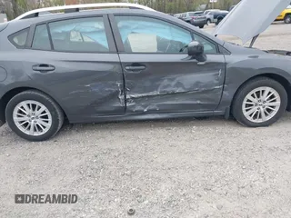 2018 Subaru Impreza Premium z VIN 4S3GTAD61J3703780, wystawiony jako IAAI lot #42081604 z przebiegiem 79 757 mil mil oraz . Historia ofert i sprzedaży dostępna na DreamBid. Obrazek 6.