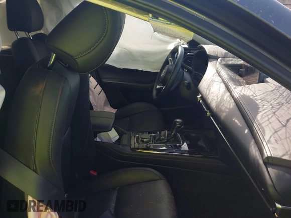 2023 Mazda CX-30 S Carbon Edition with VIN 3MVDMBCM6PM510231, listed as a IAAI auction lot 42579591 with 29,240 mi miles and . Bid and sale history available at DreamBid. Image 5.
