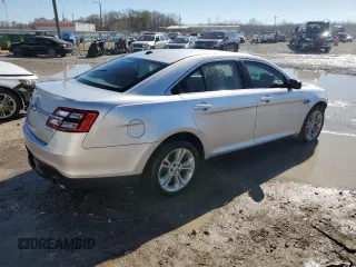 2015 Ford Taurus SE with VIN 1FAHP2D84FG149799, listed as a Copart auction lot 88993345 with 114,131 mi miles and Salvage Title. Bid and sale history available at DreamBid. Image 3.