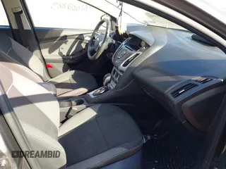 2014 Ford Focus SE with VIN 1FADP3F28EL424707, listed as a IAAI auction lot 42002883 with 115,746 mi miles. Bid and sale history available at carsss.com. Image 5.
