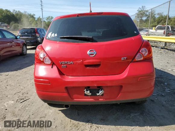 2009 Nissan Versa 1.8 S with VIN 3N1BC13E79L428938, listed as a Copart auction lot 69964494 with 146,587 mi miles and Salvage Title. Bid and sale history available at carsss.com. Image 6.