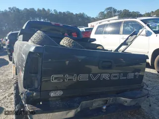 2003 Chevrolet Silverado 1500 Work Truck with VIN 2GCEC19XX31352031, listed as a IAAI auction lot 41283482 with 131,106 mi miles. Bid and sale history available at carsss.com. Image 15.