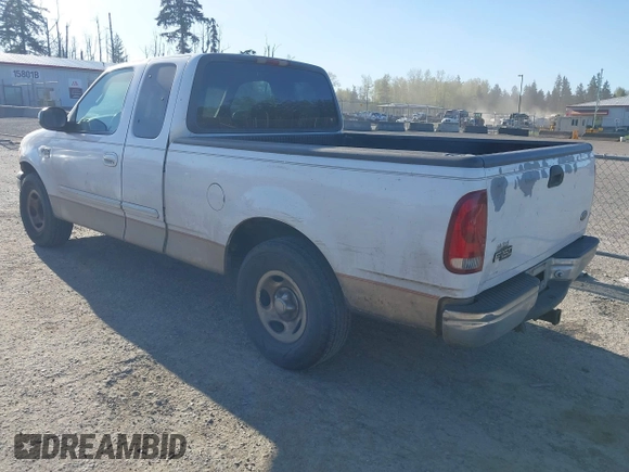 2000 Ford F-150 XL with VIN 1FTRX17W4YKA47244, listed as a IAAI auction lot 42076893 with 362,114 mi miles. Bid and sale history available at carsss.com. Image 3.