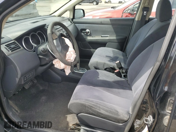 2009 Nissan Versa S with VIN 3N1BC13E49L363630, listed as a Copart auction lot 53118515 with 135,573 mi miles and Salvage Title. Bid and sale history available at DreamBid. Image 7.