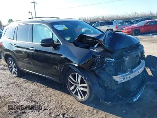 2016 Honda Pilot Elite with VIN 5FNYF6H01GB050524, listed as a IAAI auction lot 41452563 with 140,326 mi miles. Bid and sale history available at carsss.com. Image 1.