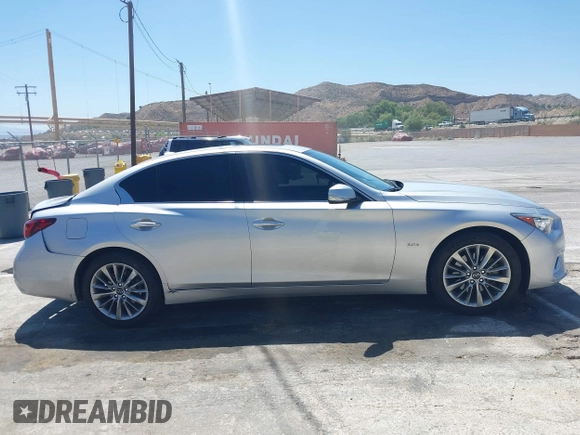 2020 Infiniti Q50 Luxe with VIN JN1EV7AP0LM203949, listed as a IAAI auction lot 42520077 with 57,531 mi miles and . Bid and sale history available at DreamBid. Image 13.