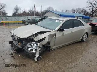 2014 Cadillac CTS Premium AWD with VIN 1G6AZ5S36E0151952, listed as a Copart auction lot 37493734 with 69,717 mi miles and Salvage Title. Bid and sale history available at DreamBid. Image 1.