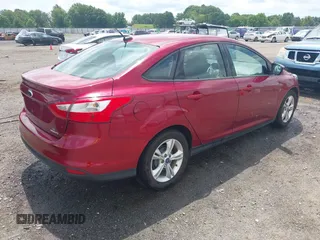 2013 Ford Focus SE z VIN 1FADP3F29DL149377, wystawiony jako IAAI lot #42472584 z przebiegiem 79 402 mil mil oraz . Historia ofert i sprzedaży dostępna na DreamBid. Obrazek 4.