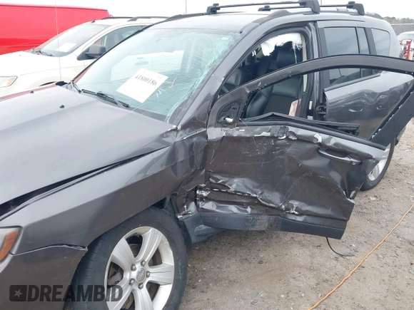 2016 Jeep Compass Latitude with VIN 1C4NJDEB4GD687300, listed as a IAAI auction lot 41800186 with 169,374 mi miles. Bid and sale history available at carsss.com. Image 6.