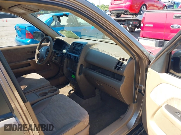 2004 Honda CR-V LX with VIN JHLRD784X4C015401, listed as a IAAI auction lot 39704765 with 158,987 mi miles and . Bid and sale history available at carsss.com. Image 5.
