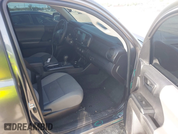 2021 Toyota Tacoma SR with VIN 3TYAX5GN9MT022049, listed as a IAAI auction lot 41958816 with 55,151 mi miles and . Bid and sale history available at DreamBid. Image 5.