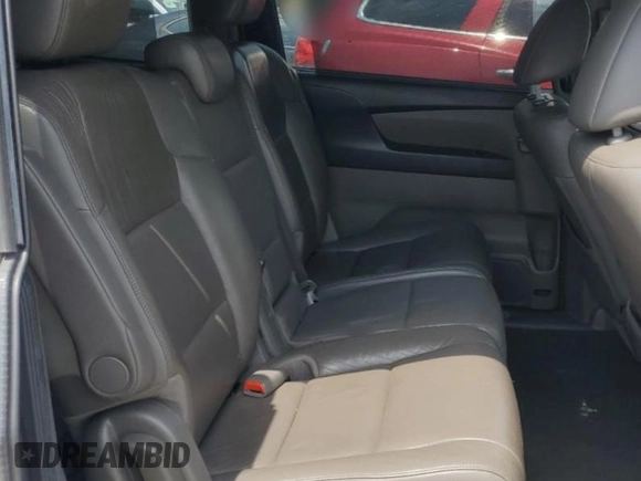 2012 Honda Odyssey Touring with VIN 5FNRL5H93CB121366, listed as a Copart auction lot 55383885 with 197,885 mi miles and Salvage title. Bid and sale history available at DreamBid. Image 11.