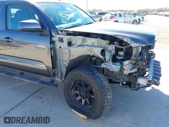 2023 Toyota Tacoma 4WD SR with VIN 3TYCZ5AN1PT146719, listed as a IAAI auction lot 41406963 with 19,735 mi miles. Bid and sale history available at carsss.com. Image 6.
