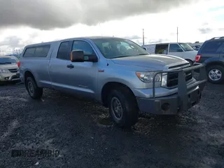 2012 Toyota Tundra with VIN 5TFCY5F16CX013317, listed as a IAAI auction lot 41254907 with 302,012 mi miles and . Bid and sale history available at DreamBid. Image 1.