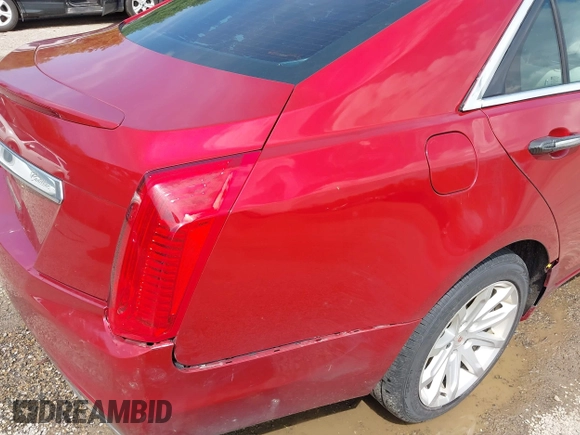 2014 Cadillac CTS AWD z VIN 1G6AW5SX3E0129127, wystawiony jako IAAI lot #42193399 z przebiegiem 108 037 mil mil oraz . Historia ofert i sprzedaży dostępna na DreamBid. Obrazek 19.